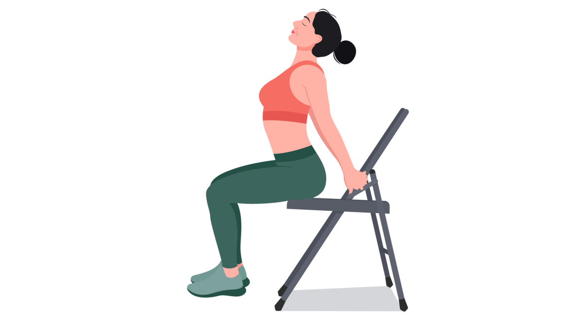 A Woman Practicing Mindfulness Exercises at Work through Seated Cat Cow Stretch