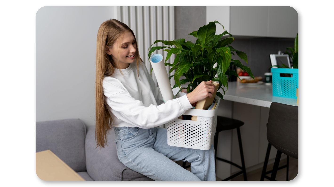 An Employee Practices Self Care At Work by Decorating Her Workspace