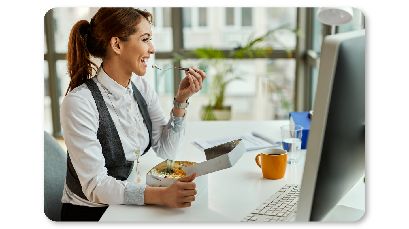An Employee Practices Self Care At Work by Eating a Balanced Diet