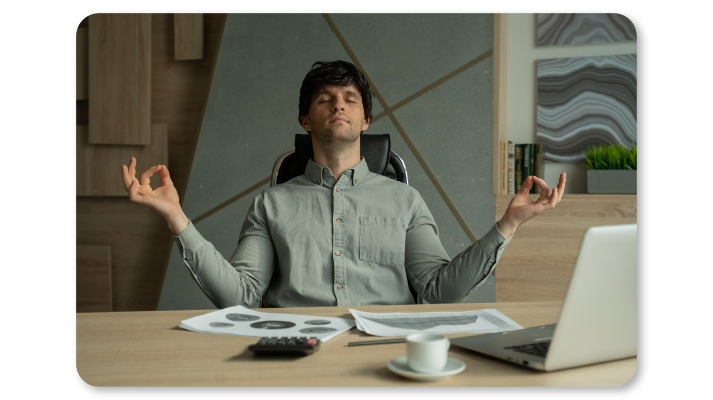 An Employee Practices Self Care At Work by Practicing Mindfulness