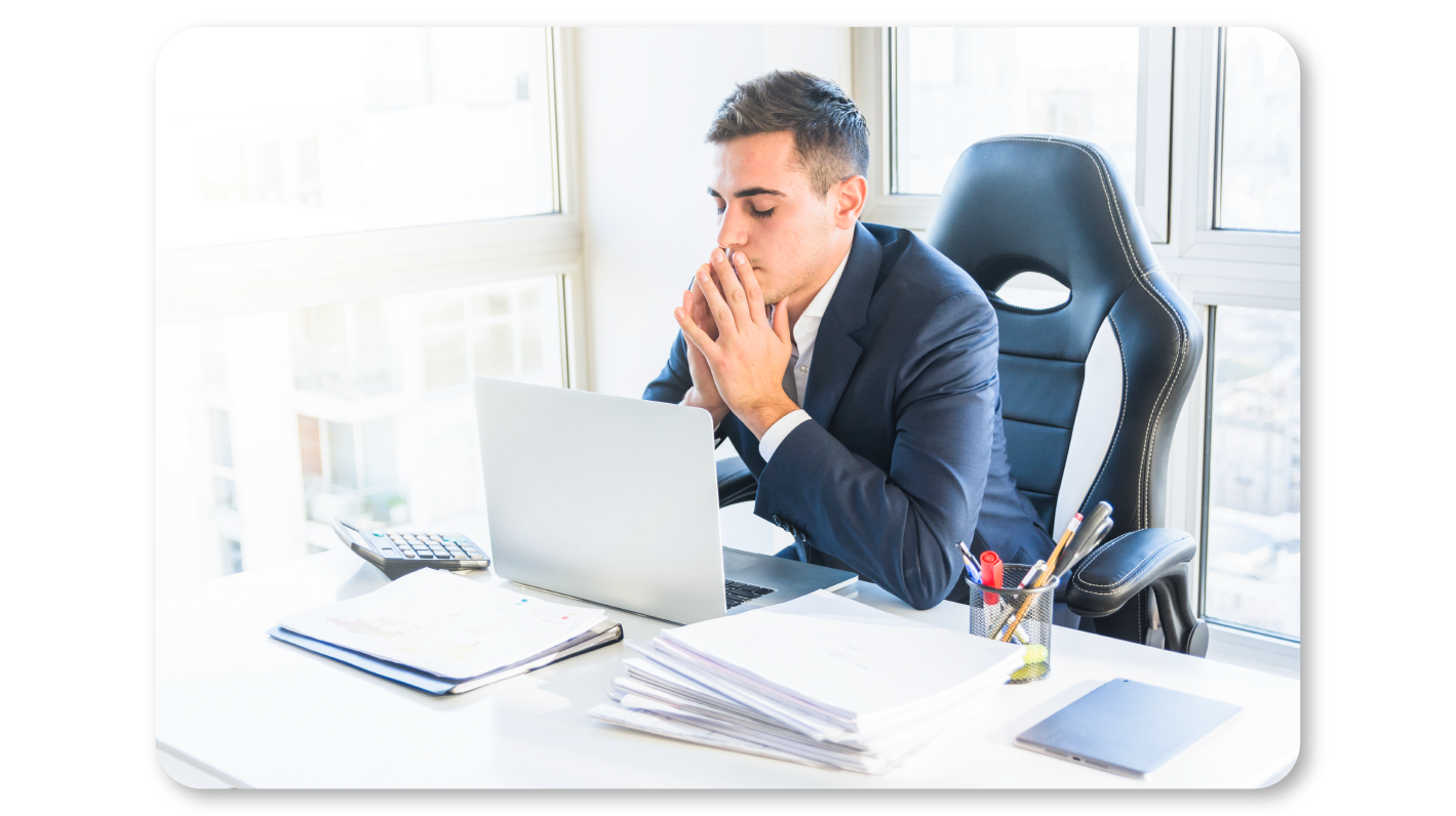 A Man Practicing Mindfulness Exercises at Work through Mindful Visualization