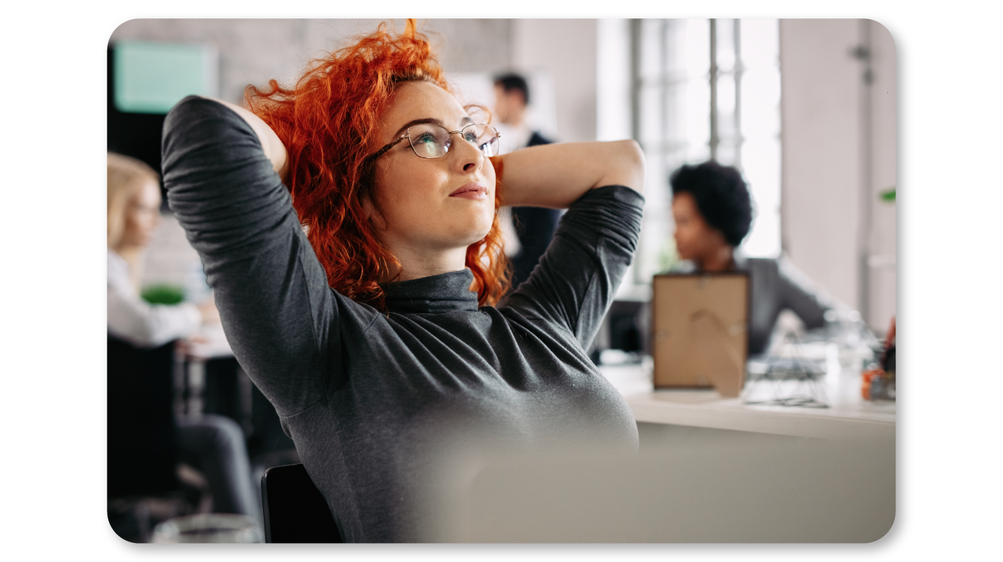 A Woman Practicing Mindfulness Exercises at Work through Mindfully Pausing and Accepting her Reality