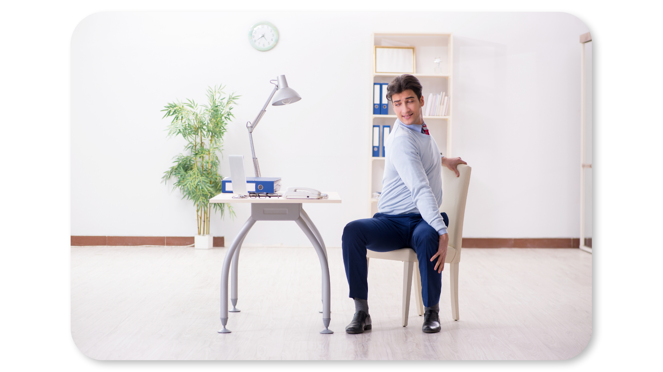 Employee practises seated twist pose