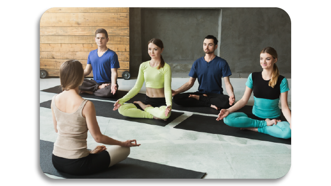 Employees attending yoga class