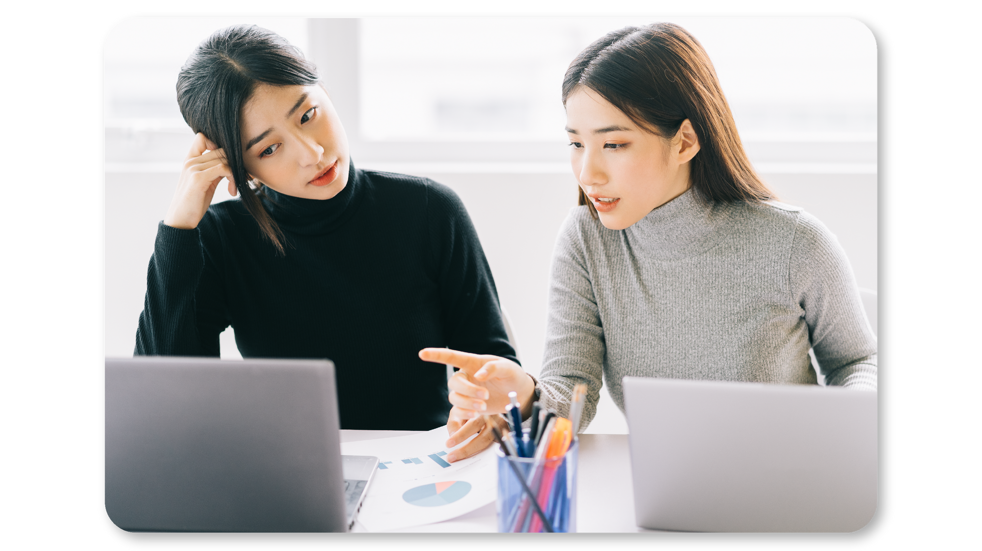 A mindful employee is assisting another employee in problem solving which in turn will benefit the employer