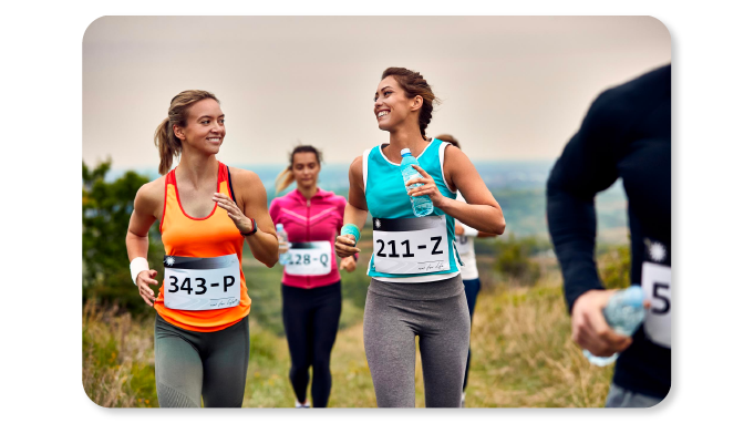 Employees enjoying competing in wellness challenges under a wellness rewards program