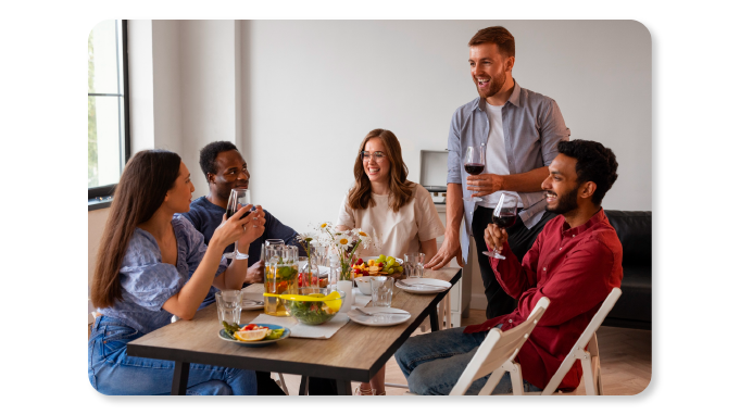 Employees enjoying a Team Lunch together in the form of Social Extrinsic Rewards