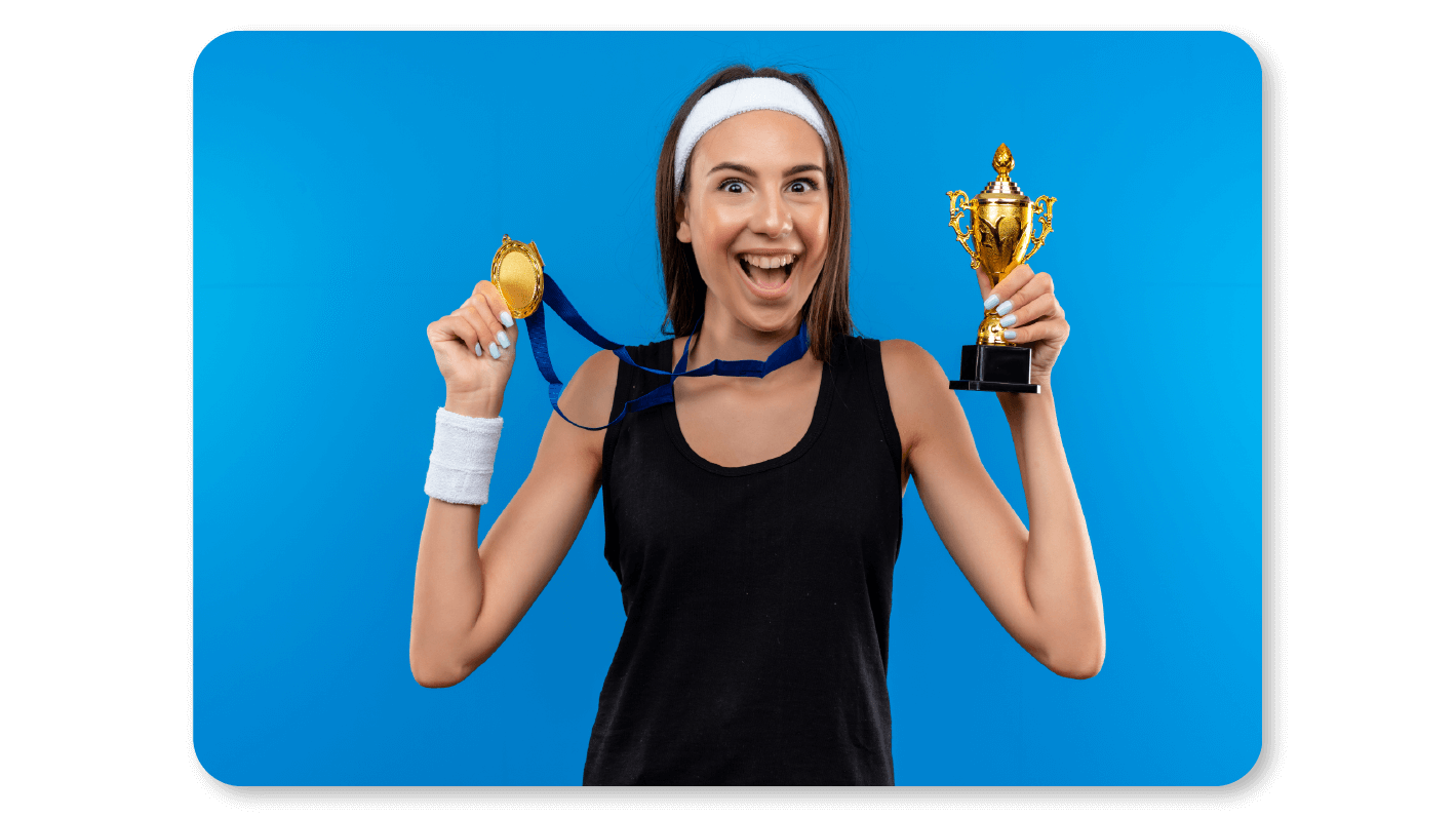 A Happy Girl holding Wellness Rewards in the form of a Trophy and a Medal to celebrate her win on some Wellness Challenge