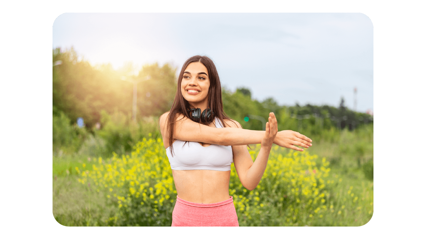 The Wellness Rewards Challenges urges a Woman to do Stretching amidst Nature