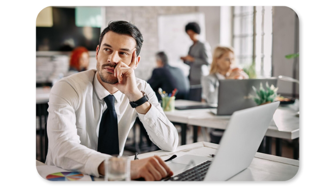 A employee sits hopeless and demotivated because his company's wellness program doesn't provide what he wants